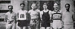 Joe, second from left, captain of the South Manchester High School (SMHS) track team, 1928-29.